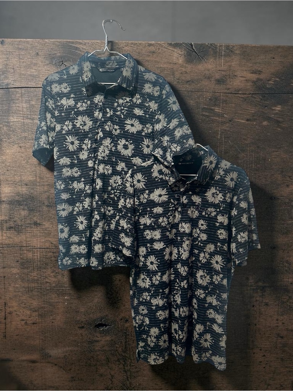 Pair of Travis Mathew Black & Tan Floral Stripe Polo Style Golf Shirts
